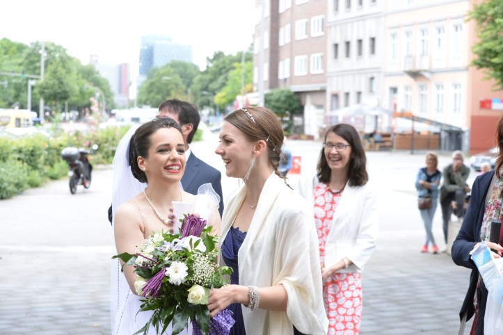 Bride giving her blessing to the next bride