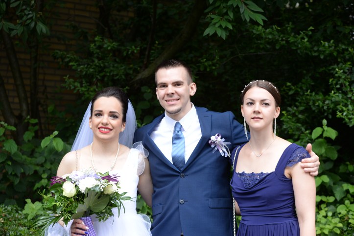 Wedding theme white purple blue with bride, groom and bridesmaid