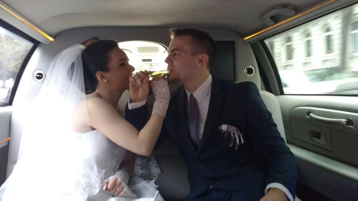 The bridal couple enjoying a glass of champagne