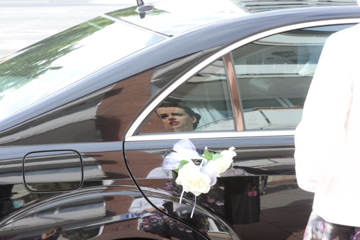 Wedding decoration on the doors of the car