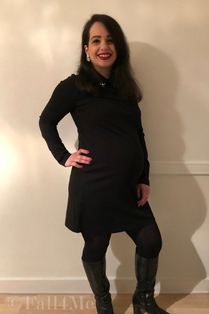 A little black dress with silver details and red lips