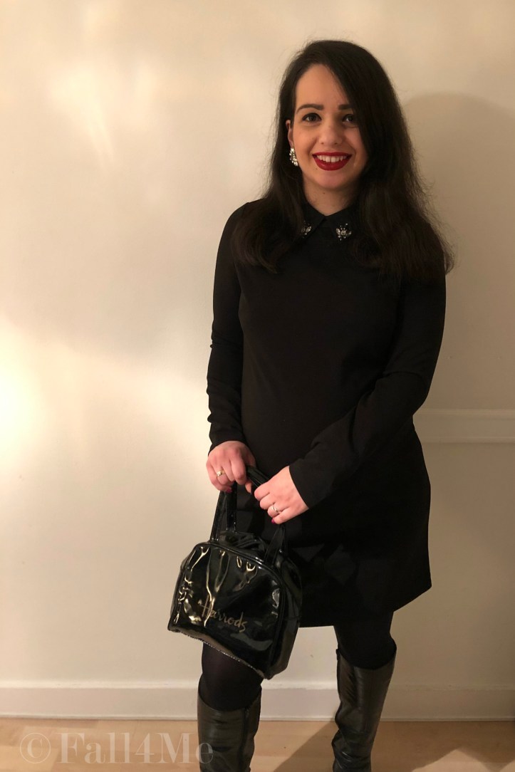 A little black dress with silver details and red lips