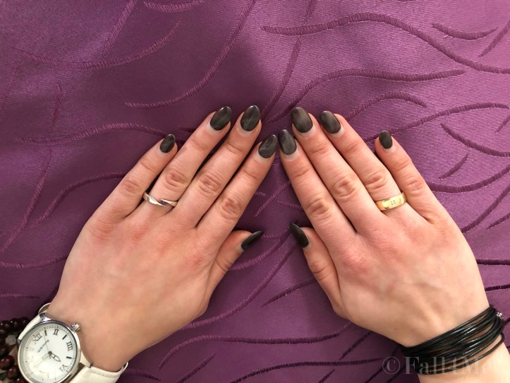 A ray of light on a black background seems like starlight on nails