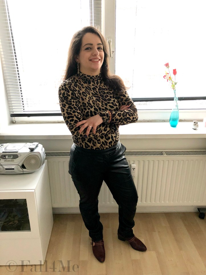 Leo print turtle neck combined with leather