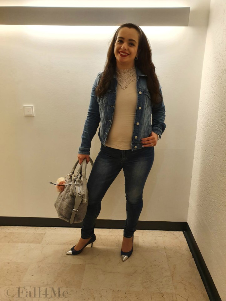 Denim on denim in different shades with silver, light grey and red lips