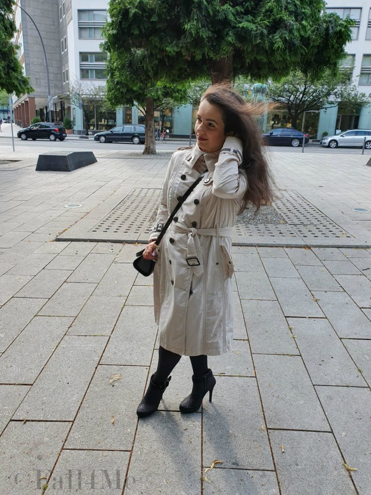 Classy trench coat combined with black