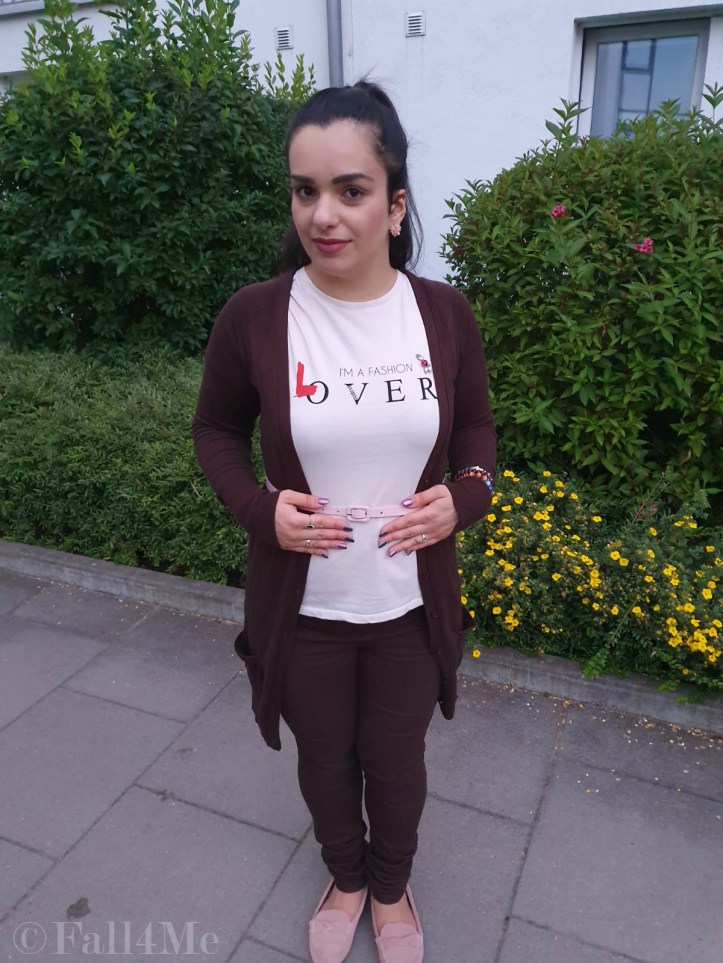 Brown with soft rose accents casually worn