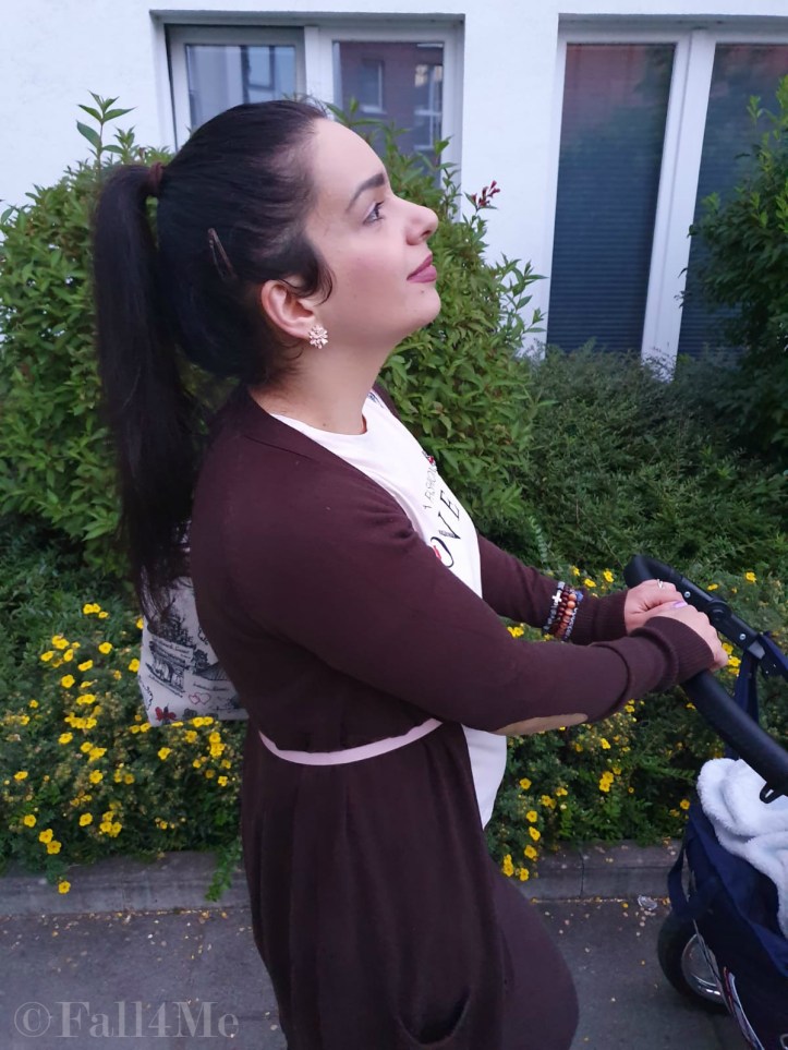 Brown with soft rose accents casually worn