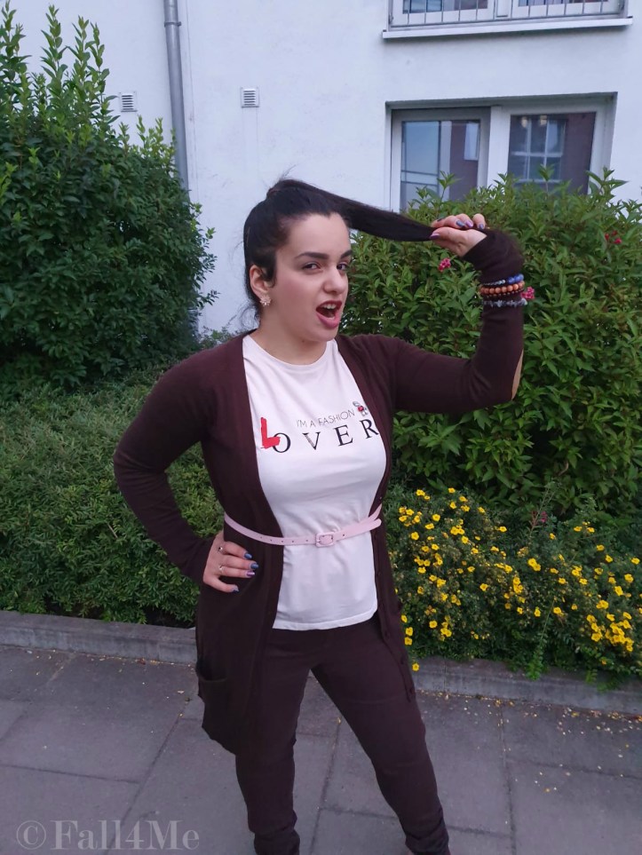 Brown with soft rose accents casually worn