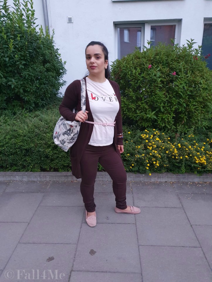 Brown with soft rose accents casually worn