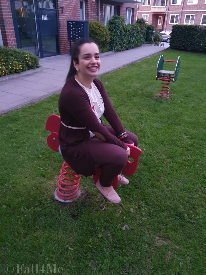 Brown with soft rose accents casually worn