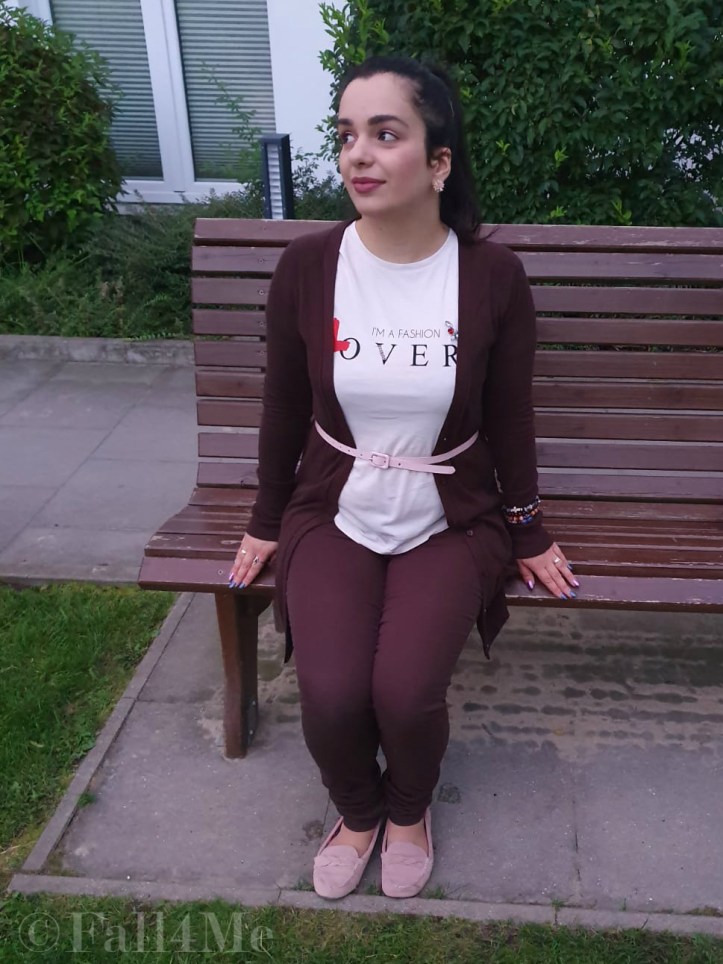 Brown with soft rose accents casually worn