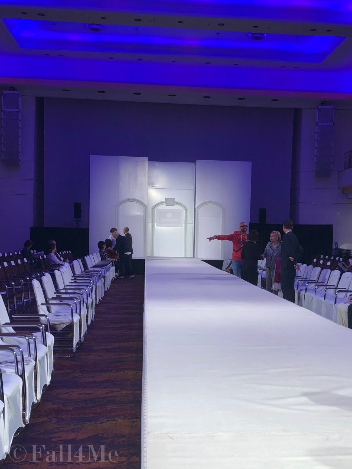 The catwalk of the Liz Malraux UNIQUE fashion show in white