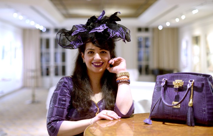 A purple outfit shade in shade by Liz Malraux with black contrasts.