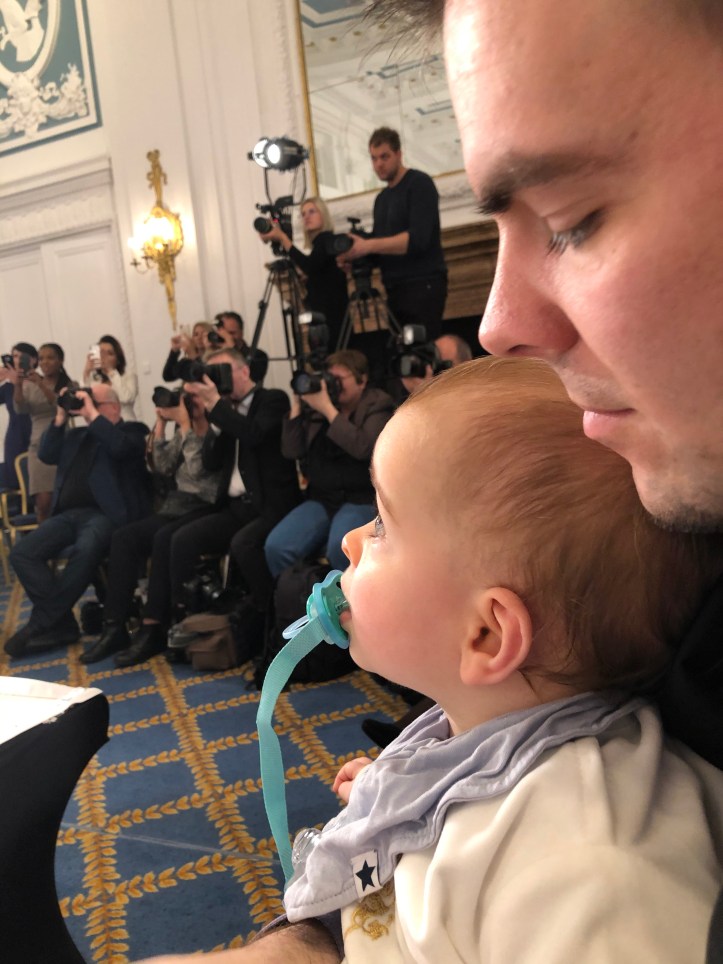 The baby admiring the models