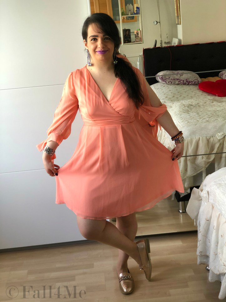 Lavender built around an apricot colored dress.