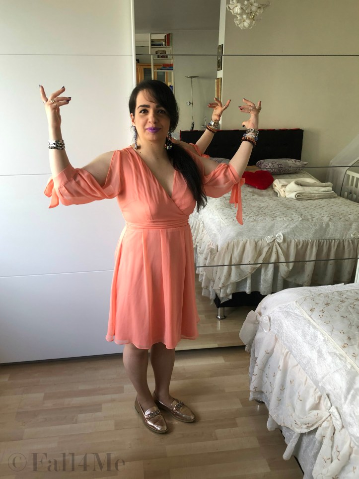 Lavender built around an apricot colored dress.