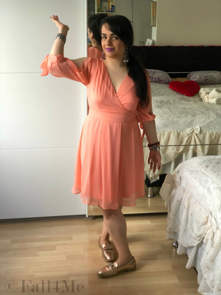 Lavender built around an apricot colored dress.