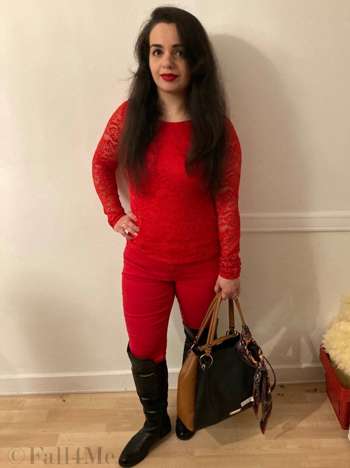 Red 100 per cent from head to toe with accessories in black (or white).