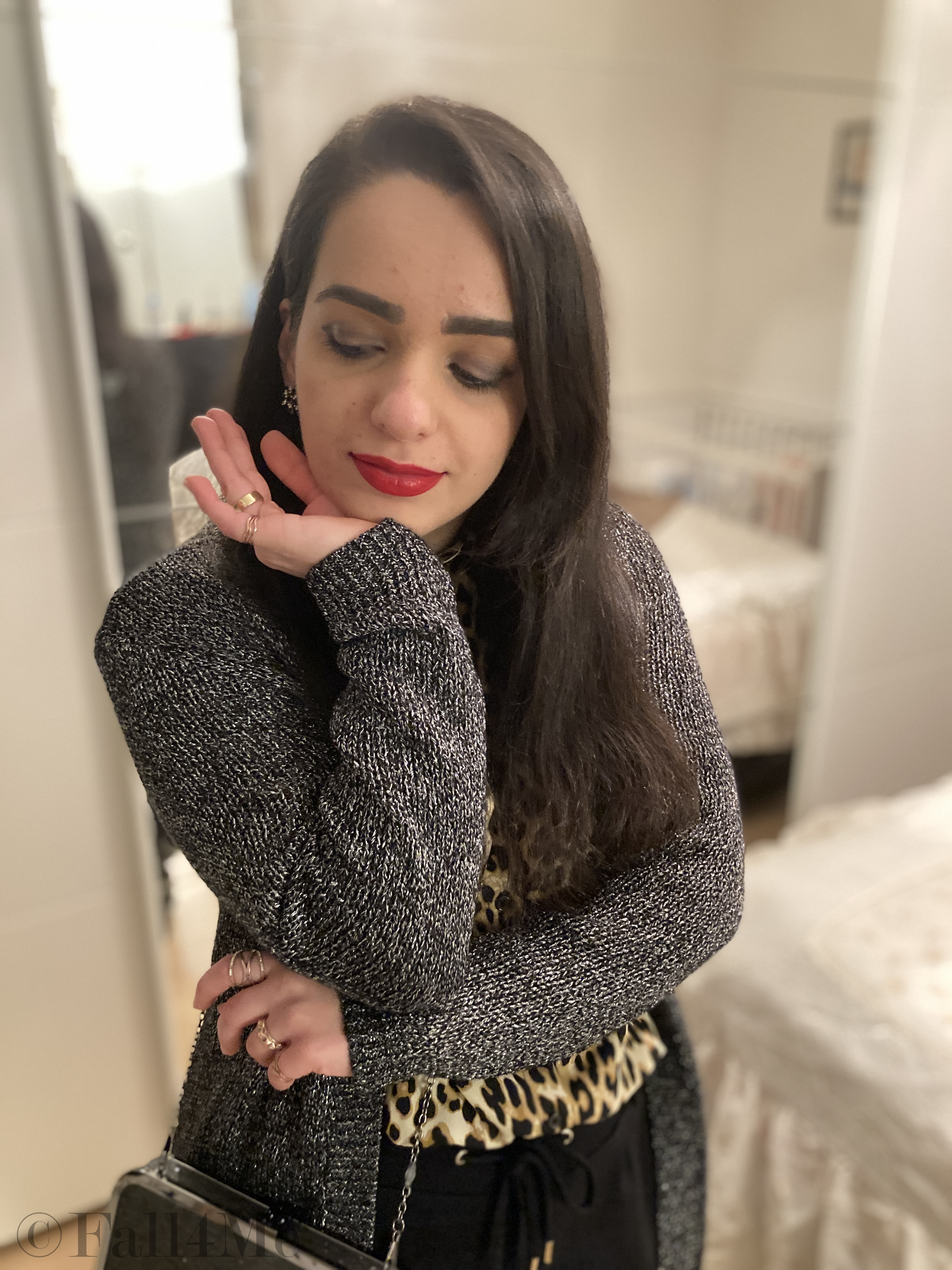 A version of the make-up trend red lips with leopard-eyes.