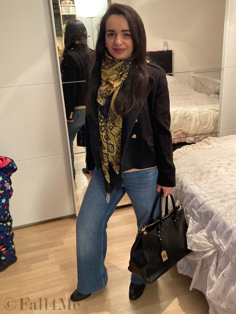 Celebrating soft retro with flared jeans, paisley pattern, shoulder pads and double breasted buttons in soft shades.