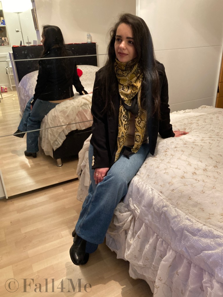 Celebrating soft retro with flared jeans, paisley pattern, shoulder pads and double breasted buttons in soft shades.