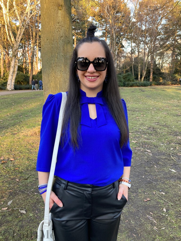 The trademark blouse by Tallinn Dolls.