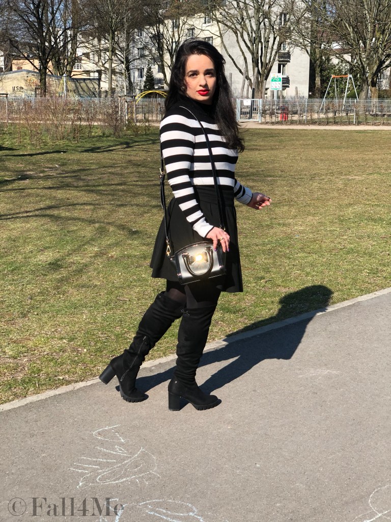 Black and white worn with a red accent and block heels.