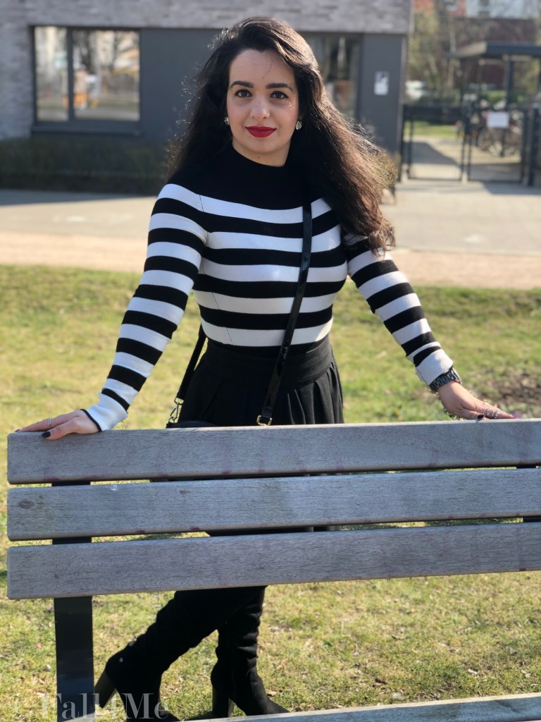 Black and white worn with a red accent and block heels.