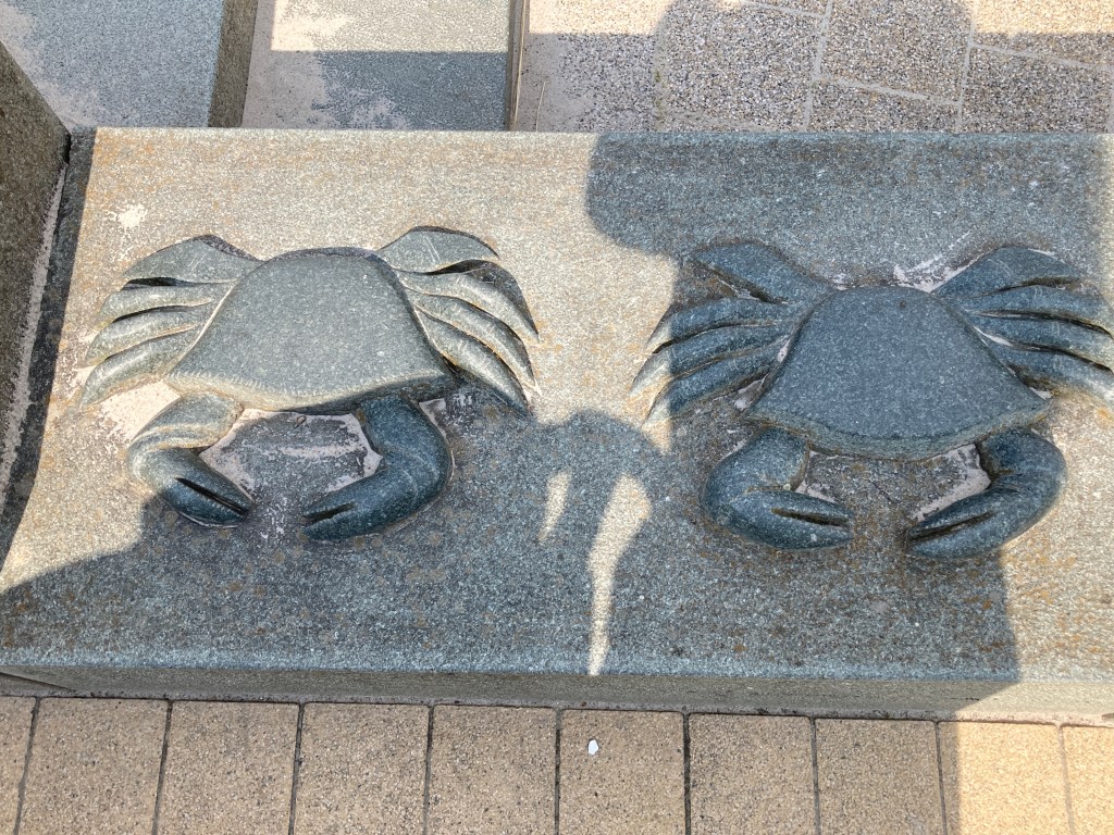 Crabs on a stone plate.