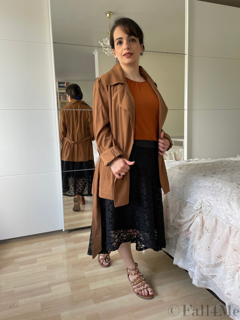 The hot trend for cool days: A summer trench with a flared skirt and sandals.