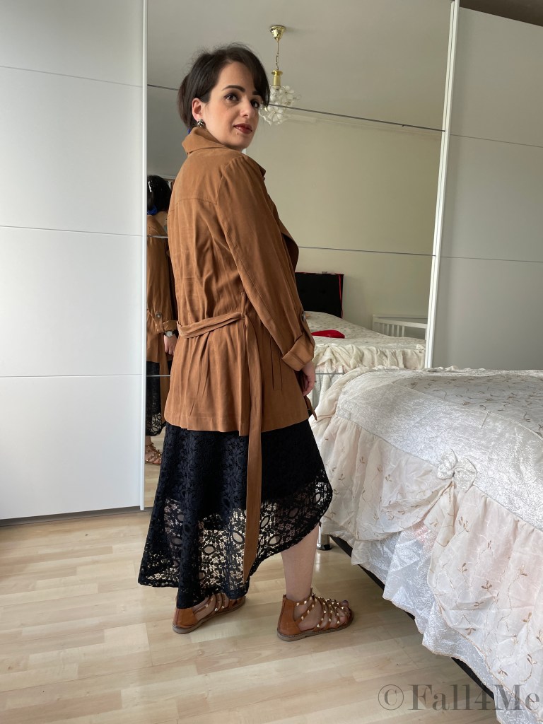 The hot trend for cool days: A summer trench with a flared skirt and sandals.