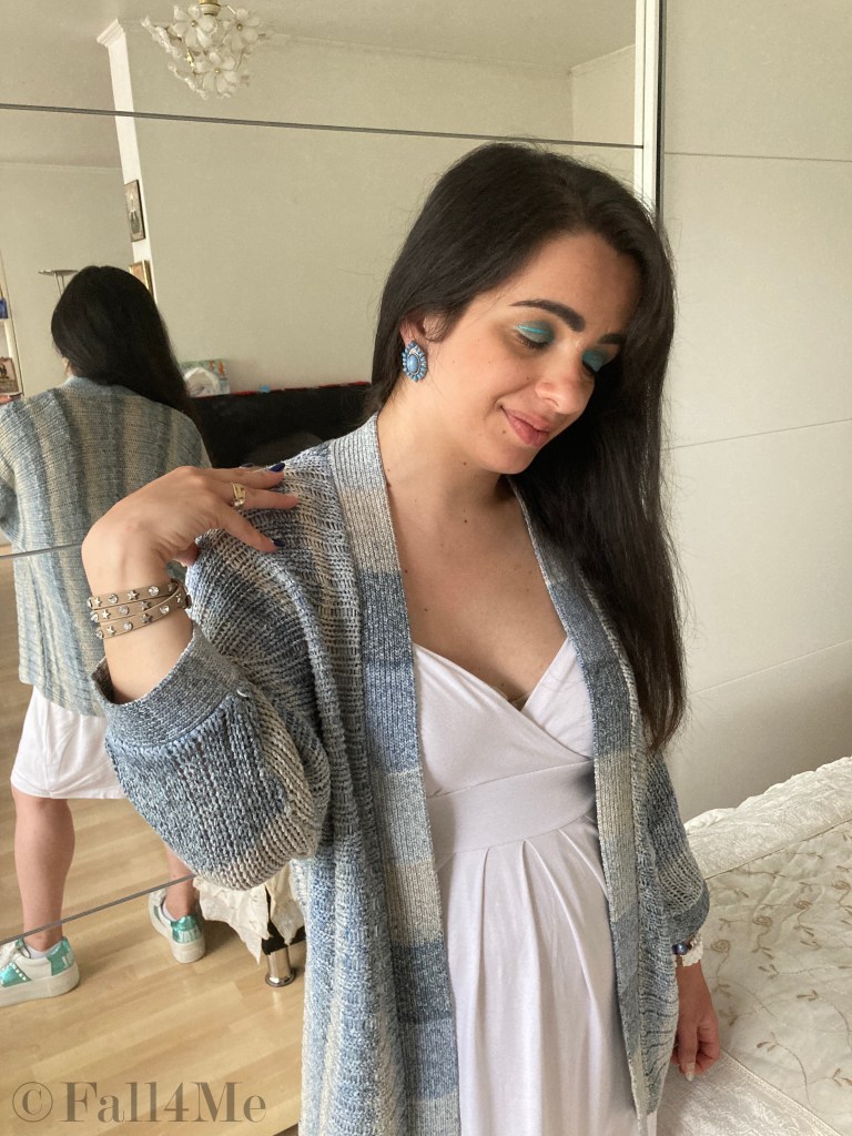 Batik and knit combined with white sneakers and a white dress.