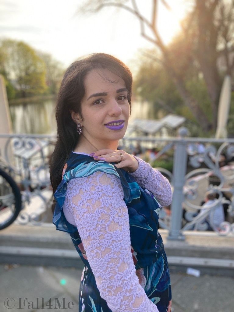 A summer dress worn over a shirt.