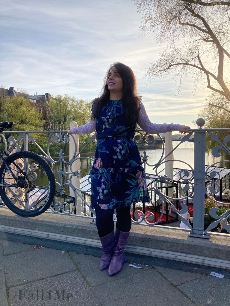A summer dress worn over a shirt.
