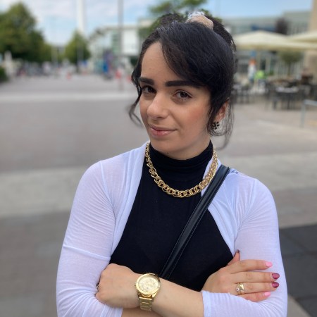 White combined with black contrasts and bold golden jewellery.