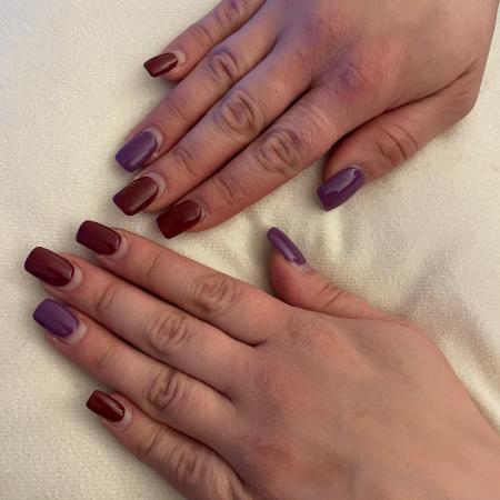 Easter nail-art in burgundy and purple.