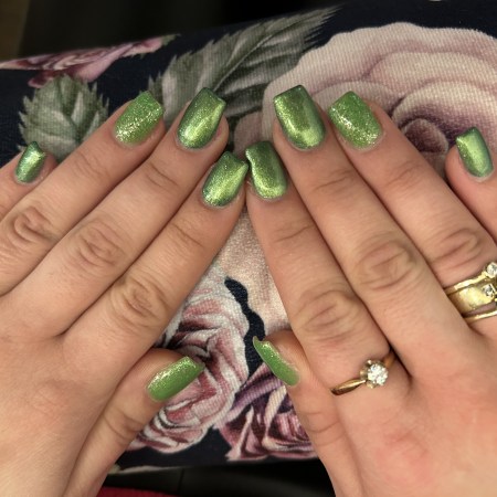 Metallic and glitter nails in lime green.