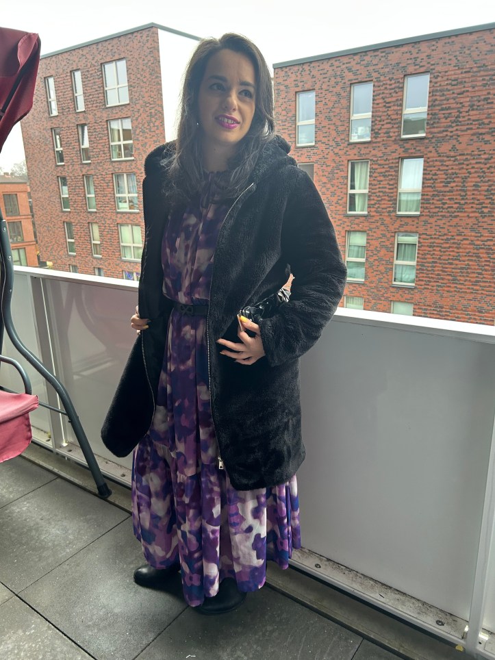 Fur and folklore worn with an accentuated waist.