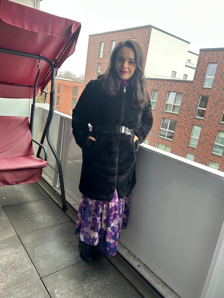 Fur and folklore worn with an accentuated waist.