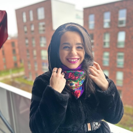 Fur and folklore worn with an accentuated waist.