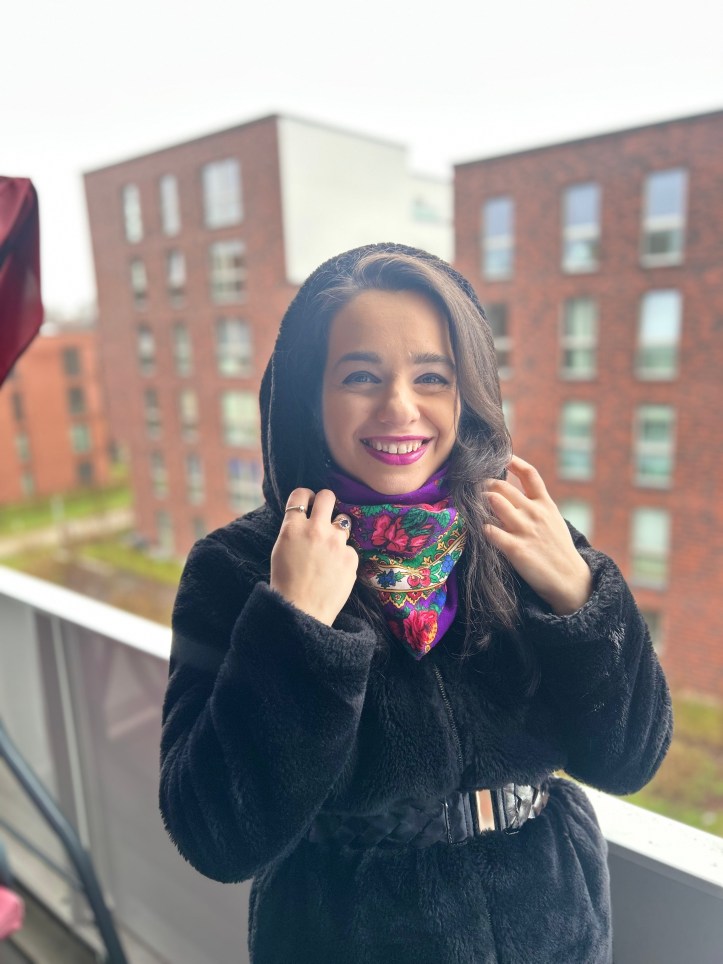 Fur and folklore worn with an accentuated waist.