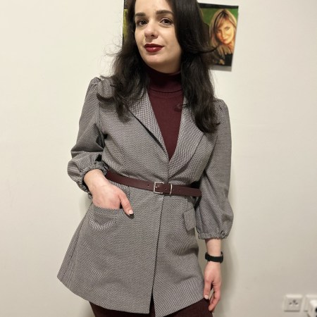 Burgundy worn with shades of grey.