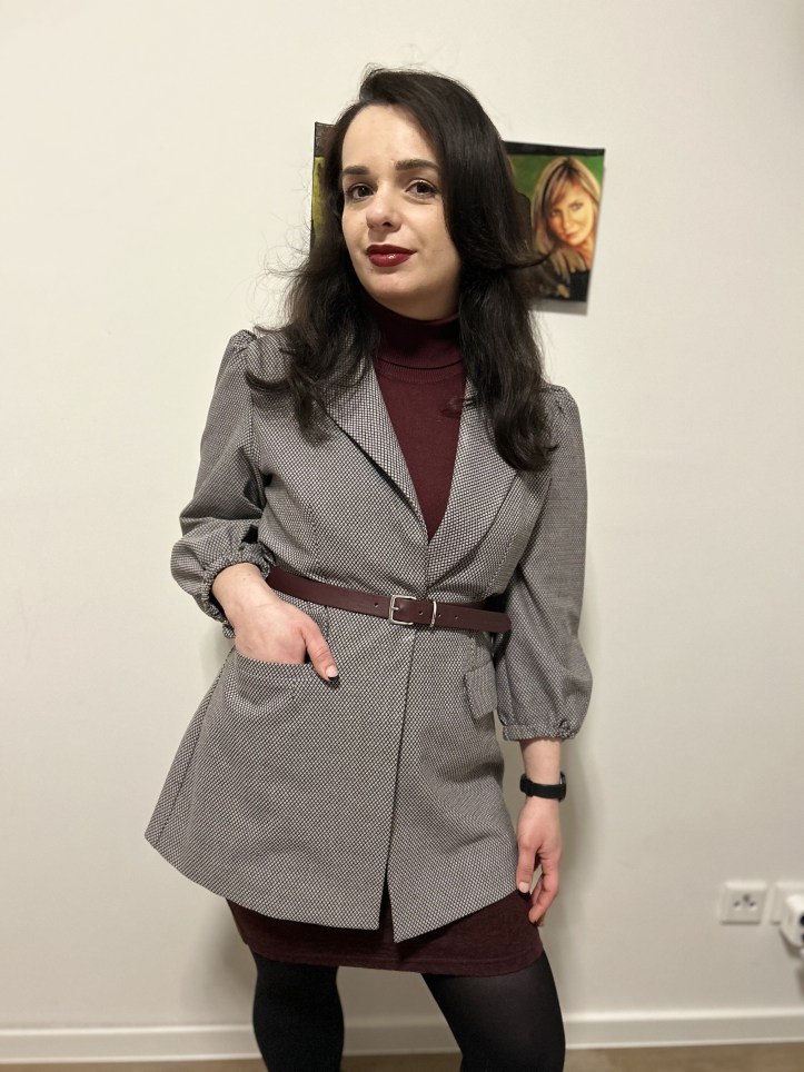 Burgundy worn with shades of grey.