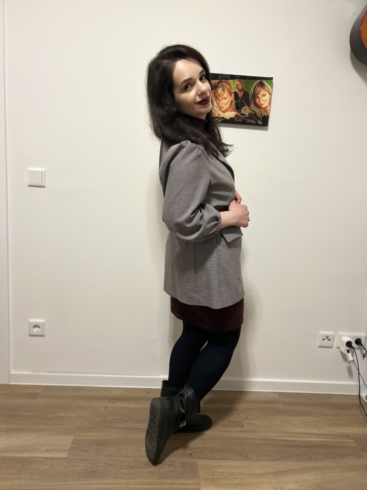 Burgundy worn with shades of grey.