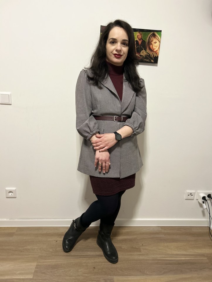 Burgundy worn with shades of grey.