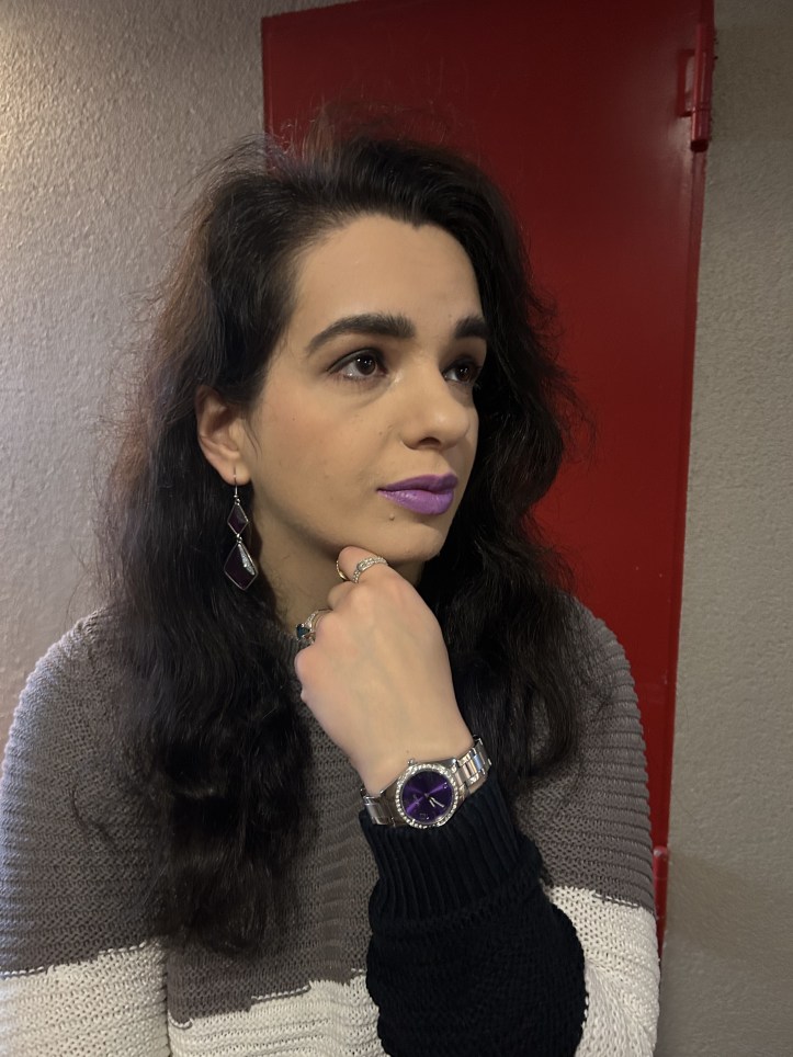 Gray pullover with colorful accents.