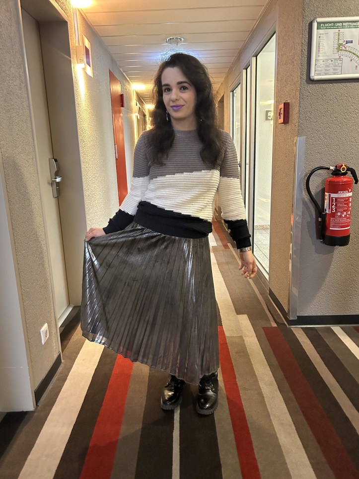 Gray pullover with colorful accents.