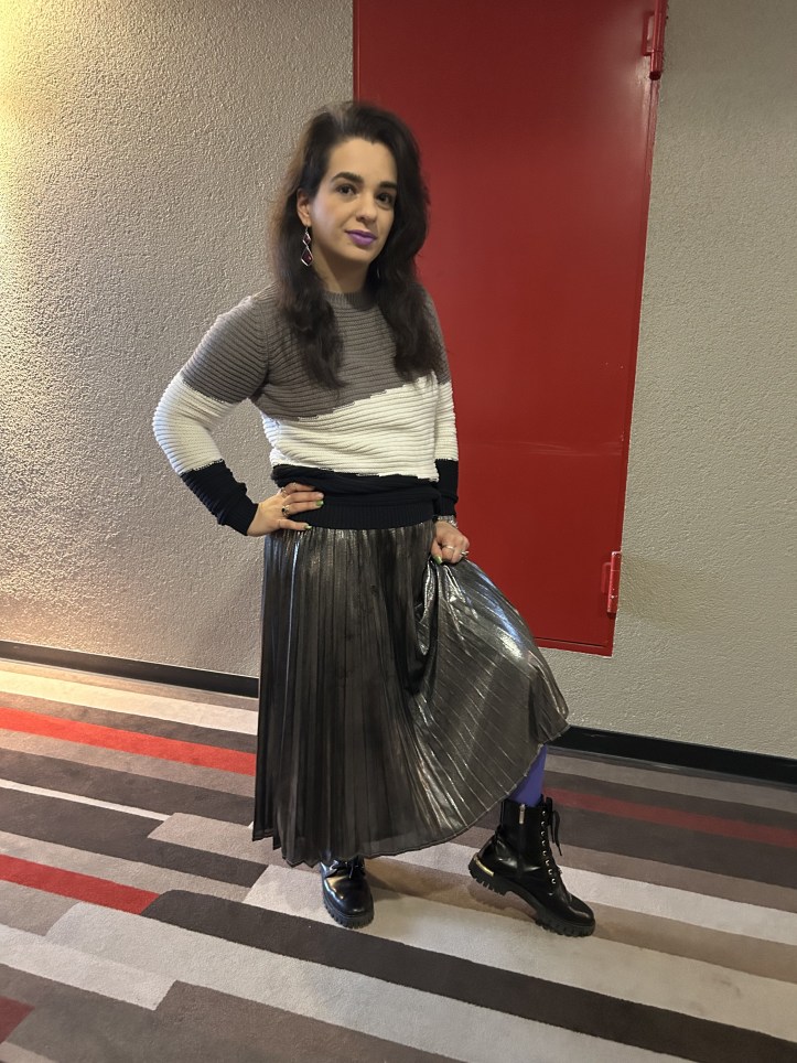 Gray pullover with colorful accents.