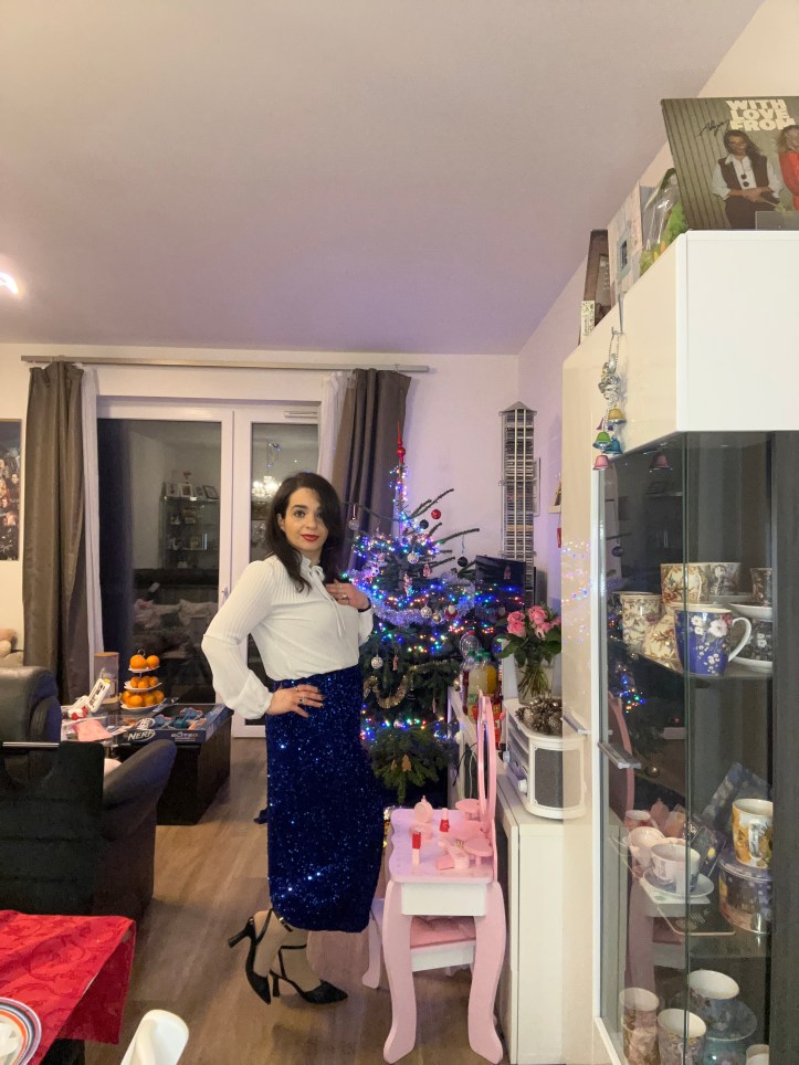 A New Year's Eve outfit in colors of the Estonian flag.